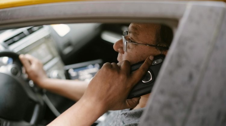 mobile phone detector cameras man on mobile while driving