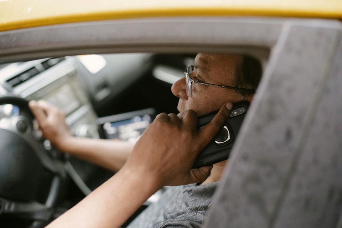 mobile phone detector cameras man on mobile while driving
